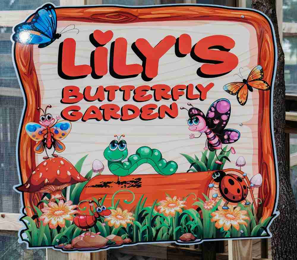 Lily's butterfly garden sign at butterfly garden at boggy creek airboat adventures