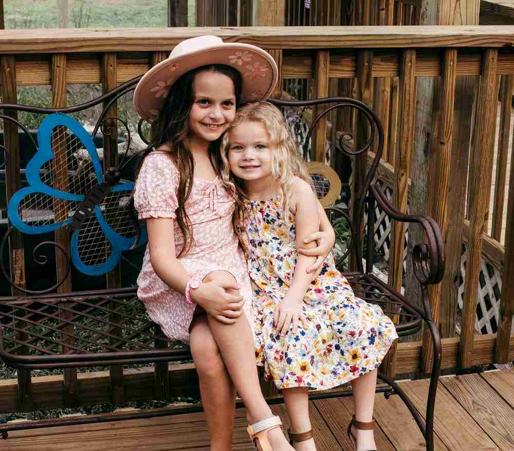 photo of young girls in butterfly garden at boggy creek airboat adventures