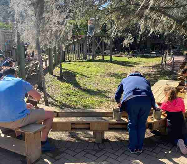 family panning gems images from gem mine at Boggy Creek Airboat Adventures